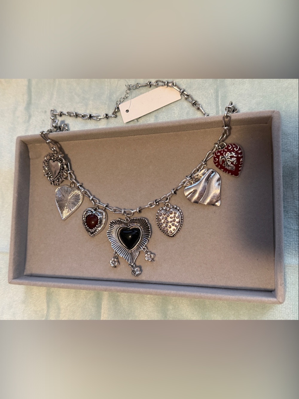 Silver-Tone Heart Charm Bracelet with Red and Black Accents